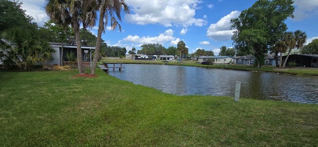 Building Photo - 2 bed 2 baths with carport