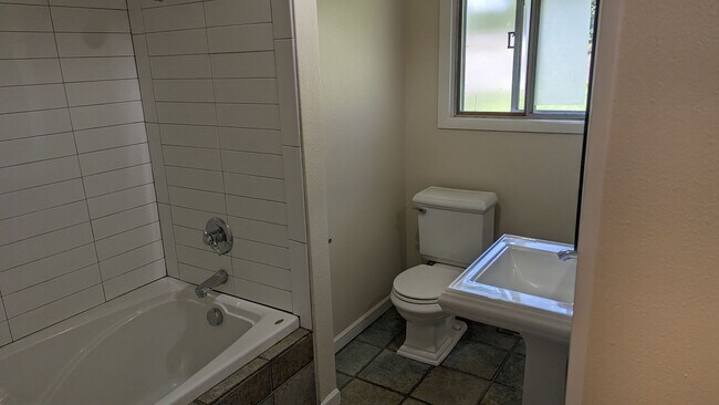 Building Photo - Spacious Three Bedroom with Large Backyard...