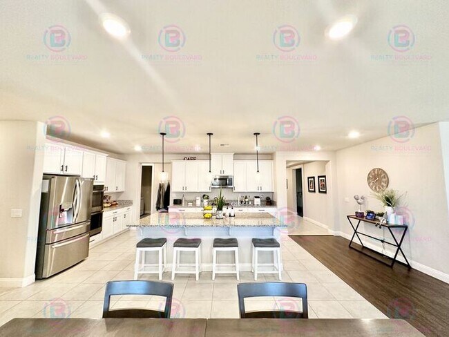 Building Photo - Welcome to your dream home, where modern elegance meets unparalleled convenience!