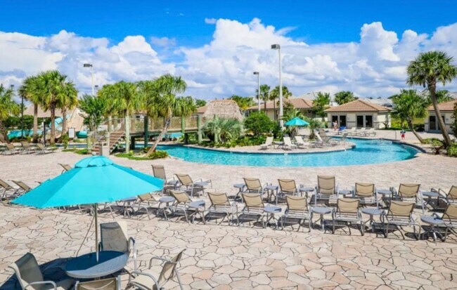 Building Photo - BEAUTIFUL CHAMPIONS GATE 2 BED 2 BATH COND0  w/GARAGE - FULLY FURNISHED - 12 MONTH RENTAL