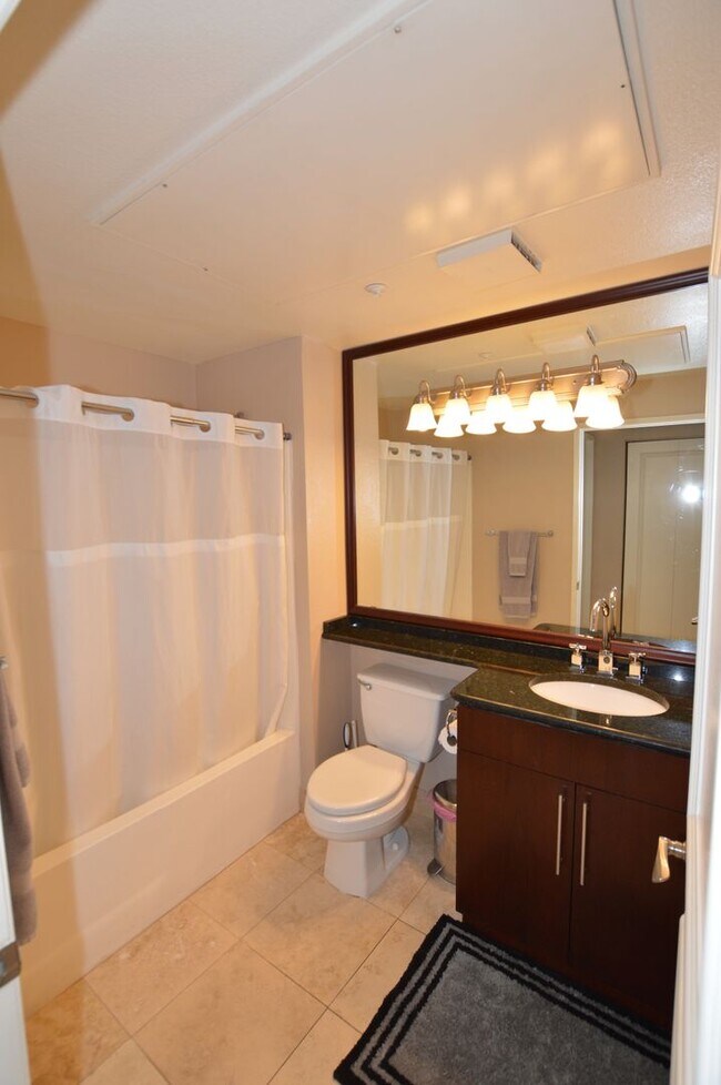 Building Photo - Meridian STUDIO Condo Fully Furnished w/Main Pool View-Lush Green trees in Resort Style Community.