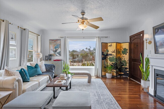 South facing lets in lots of natural sunlight. Black out curtains keep the home private at night. - 1150 W 25th St