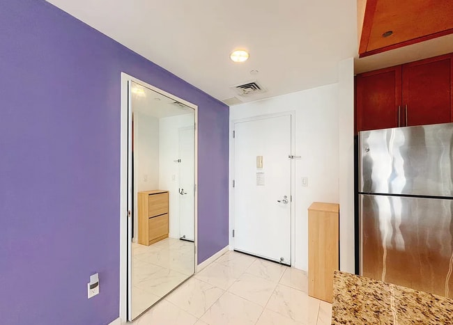 Building Photo - "Modern 1-Bed Oasis in Flushing with Pool ...