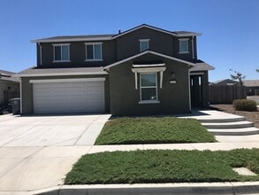 Building Photo - 4-Bedroom, 2.5-Bath Corner Home