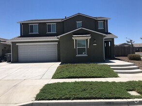 Building Photo - Nearly New 4-Bedroom, 2.5-Bath Corner Home...