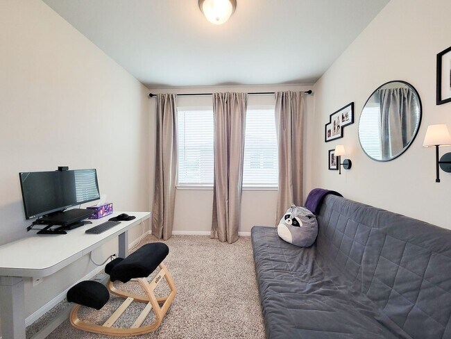 Building Photo - A true gem on a quiet corner lot, this spacious and sun-filled home is tucked away from street no...