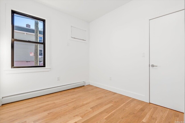 Building Photo - 61-21 55th St