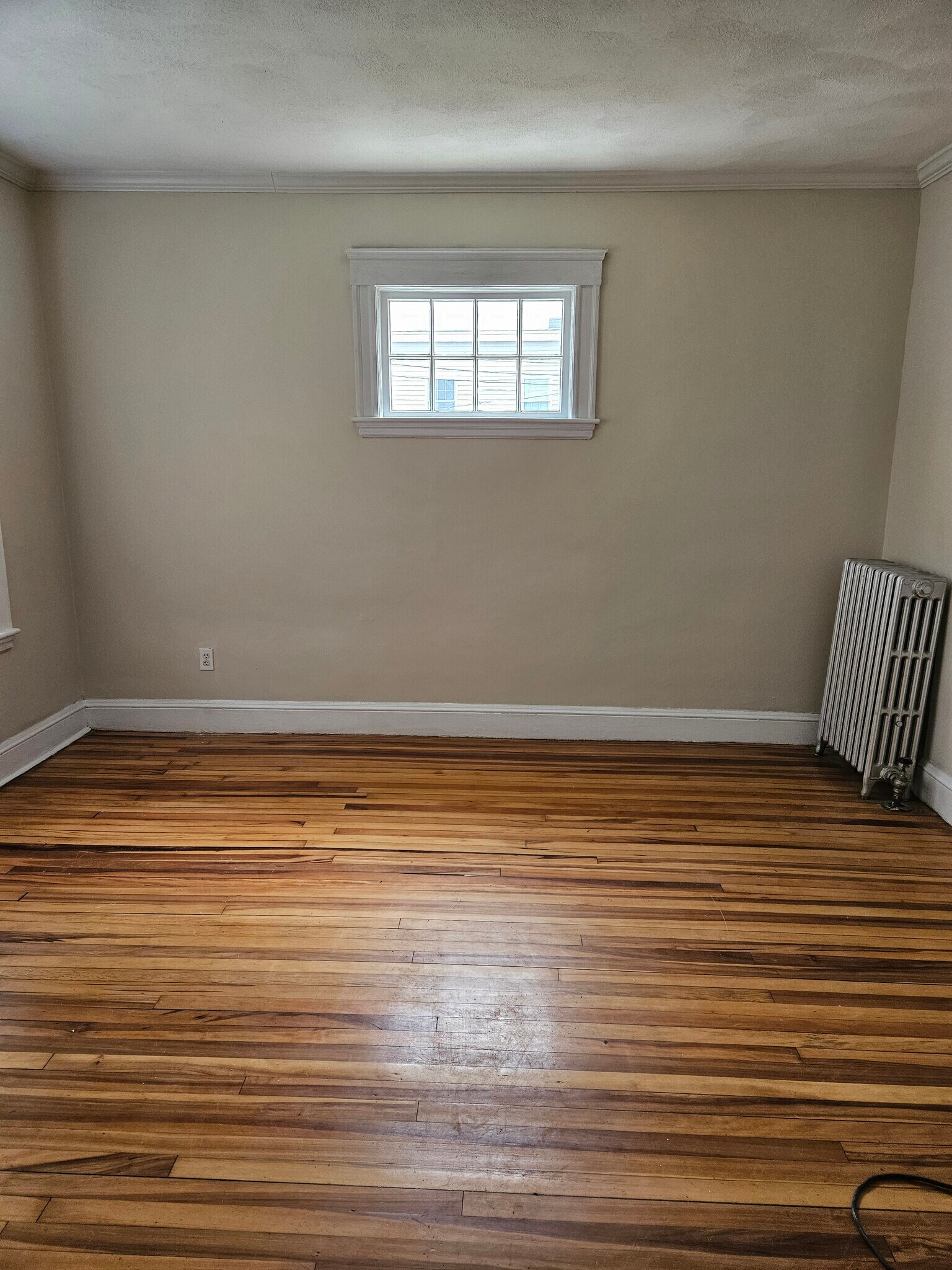 Living Room with Piano Window - 1495 River St