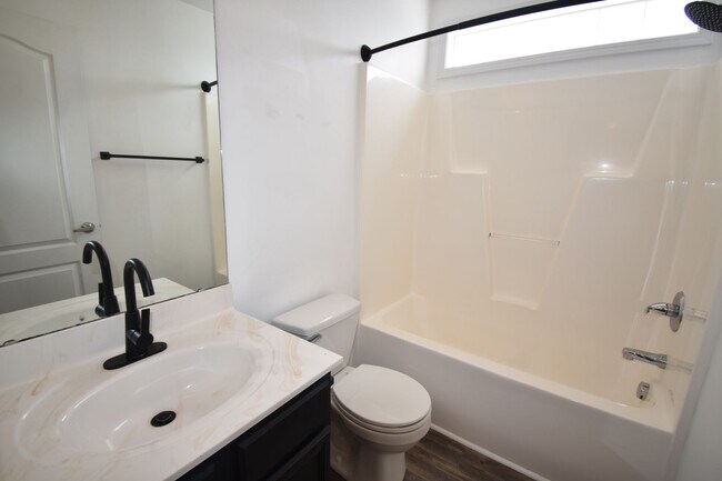 Building Photo - (Coming Soon)   4 Bedroom and 2.5 Bath Hom...