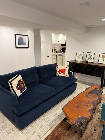 Basement apartment furnished living room - 2651 15th St NW