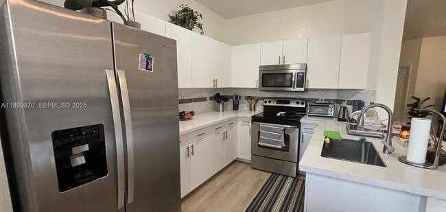 Building Photo - 12515 SW 124th Path