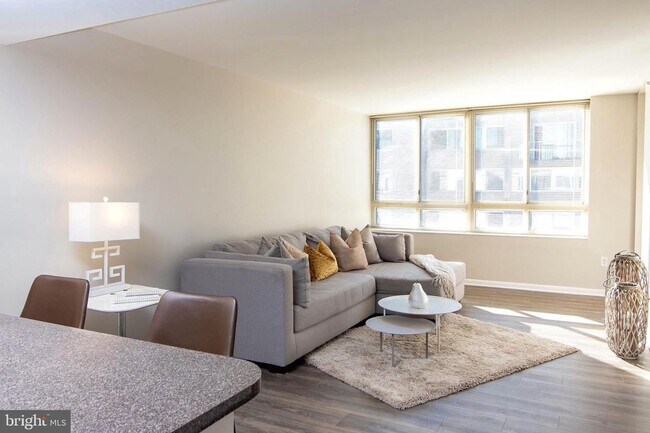 Building Photo - Bright 1BR with Parking Included, Minutes from The Wharf!