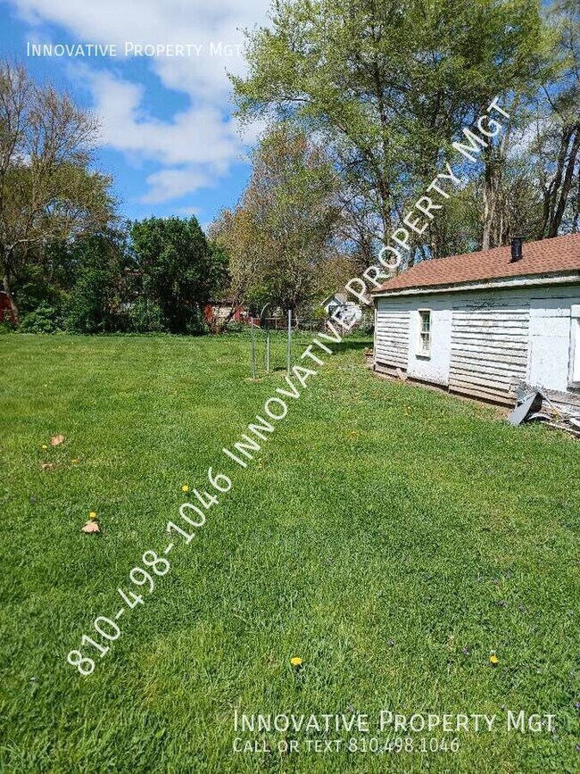 Building Photo - 5181 1/2 N. Elms-#1