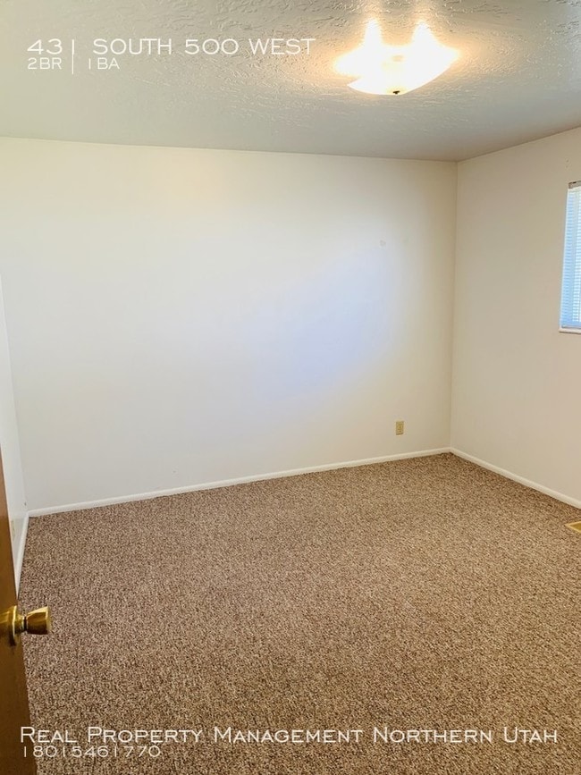 Building Photo - 2 Bedroom 1 Bath Brigham Duplex.