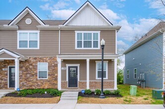 Building Photo - Bright 3-Bed End-Unit Townhome in Cedar Station with Modern Finishes & Private Outdoor Spaces