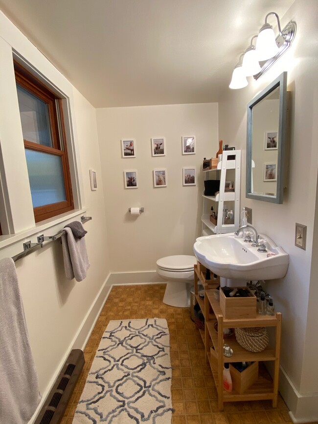 newly painted bathroom, privacy windows, well -lit - 340 NE Beyrl Ter