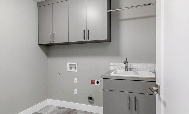 Building Photo - Bethany Stunner - 5 Bedrooms with Main-Level Bed & Bath, Modern Kitchen & Private Fenced Yard