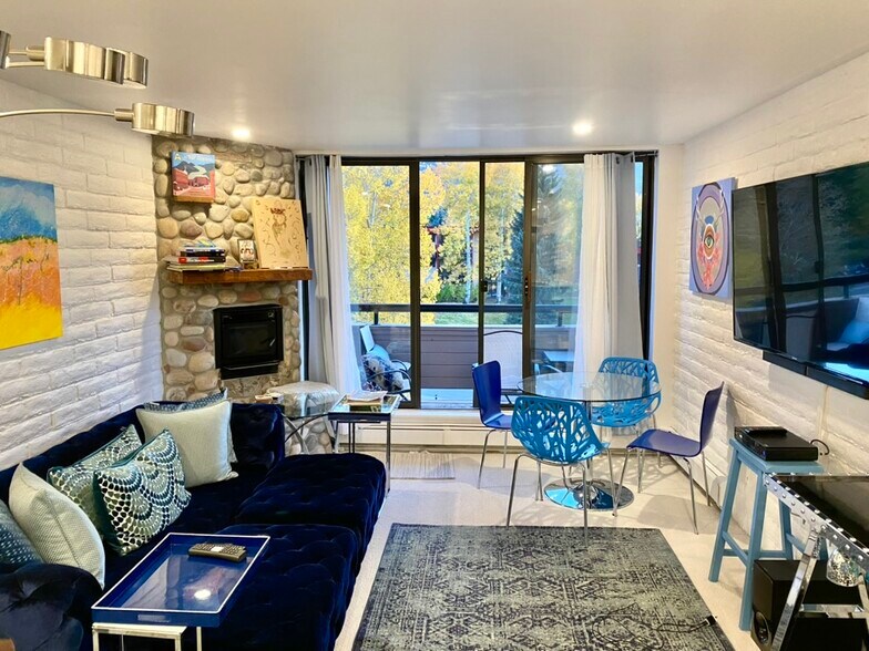 Living Room with stone fireplace - 333 Vine St