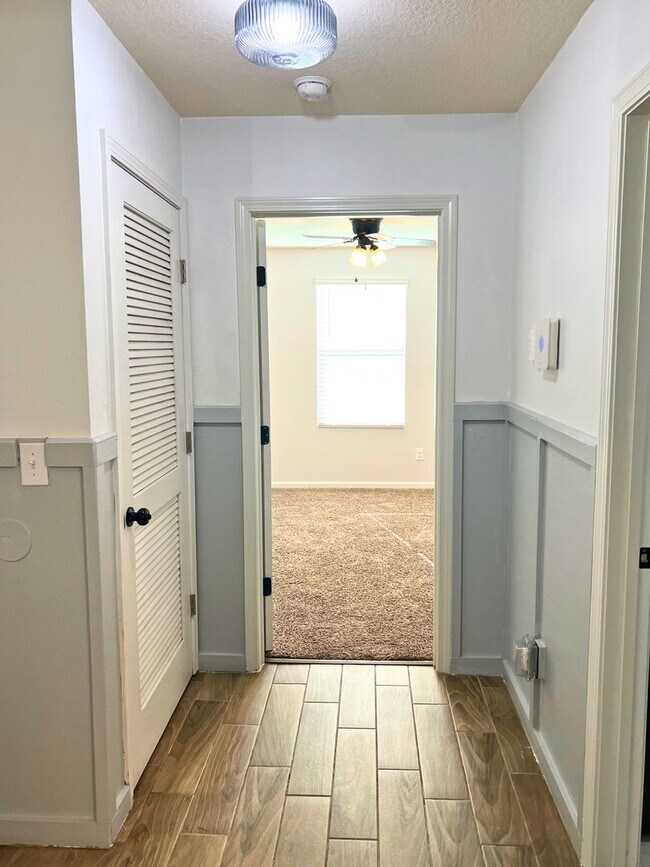 Building Photo - Stylish 4-Bedroom Home with Fenced Yard – ...