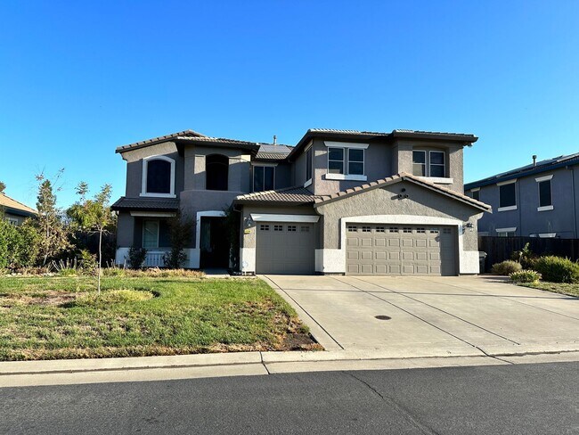 Building Photo - Spacious 4 Bed, 3 Bath Home with Bonus Room & Golf Course Views in Wild Wings