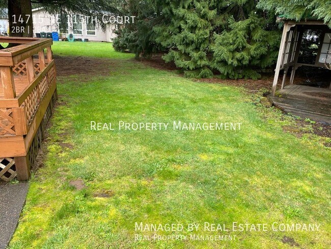 Building Photo - Ranch Style Brush Prairie Home with Large ...