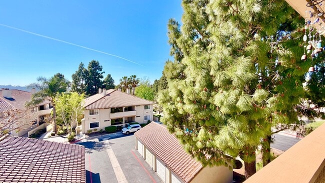 Building Photo - Beautifully Remodeled and Updated Upstairs Condo Unit in the Private & Gated Vista Way Village Co...