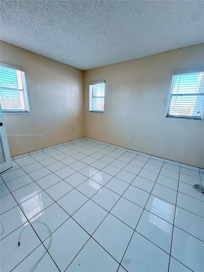 Building Photo - 8595 Sunrise Lakes Blvd