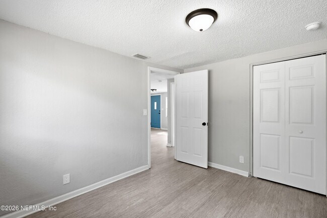 Building Photo - 7386 Dostie Dr E
