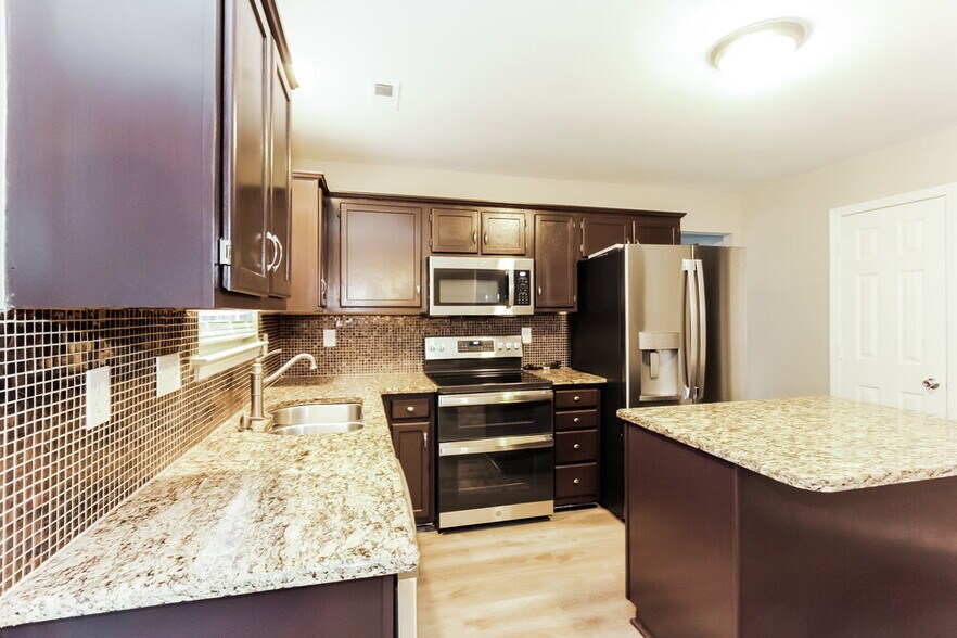 Building Photo - 9735 Baxter Caldwell Dr