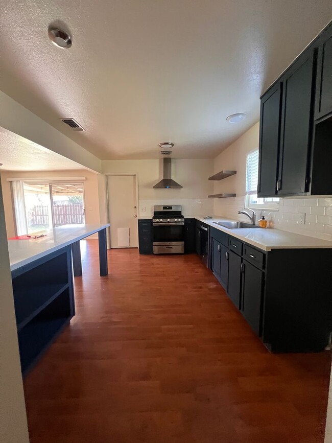 Building Photo - Available right away - 4 bedroom 2 bath