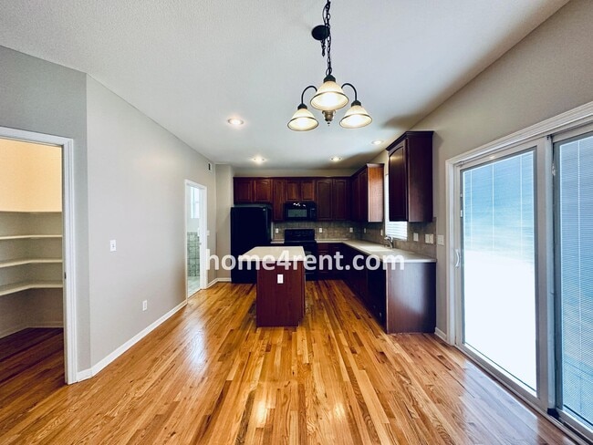 Building Photo - Wood Floors, Open Layout, Plenty of Natura...