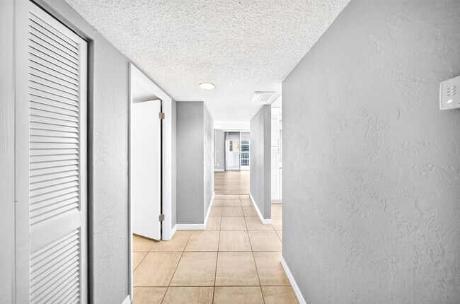 Building Photo - Completely Renovated High-Rise Condo with Ocean & River Views