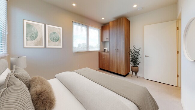 Building Photo - The Evelyn Townhomes: Luxe Living in the H...