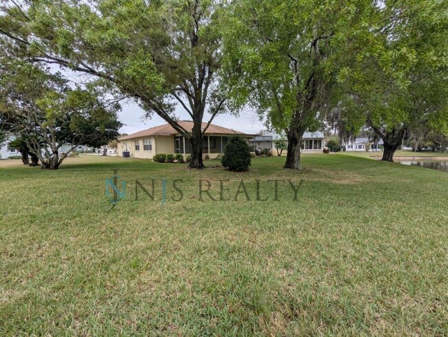 Building Photo - 55+ Community: 2/2/2 1605sqft lakefront co...