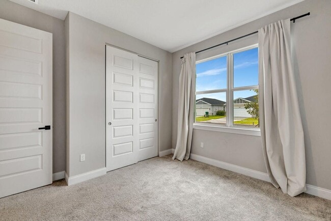 Building Photo - 8606 Dahlia Cir