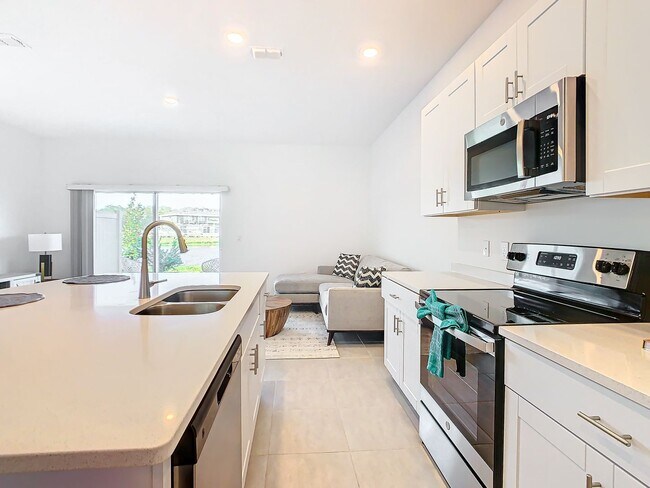 Building Photo - AVAILABLE NOW! 3/2.5 Townhome For Rent in Bellalago!