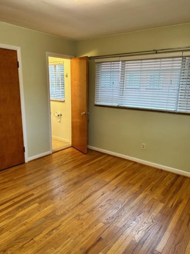 Bedroom 1/door to half bath - 437 N Eton St