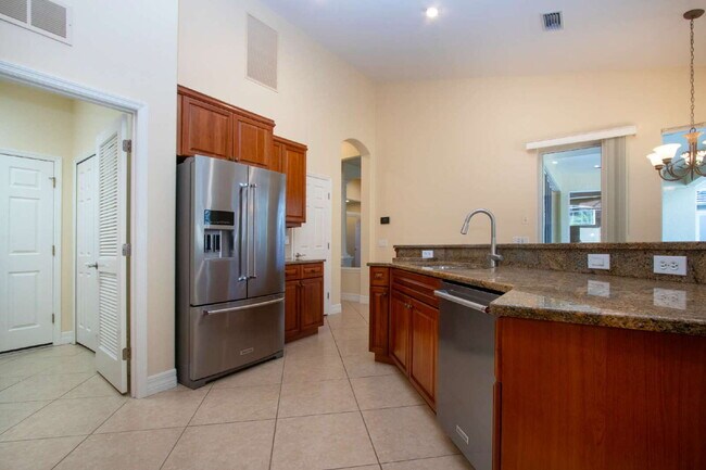 Building Photo - Rarely available executive home in The Hammocks is ready to rent on a long-term lease.