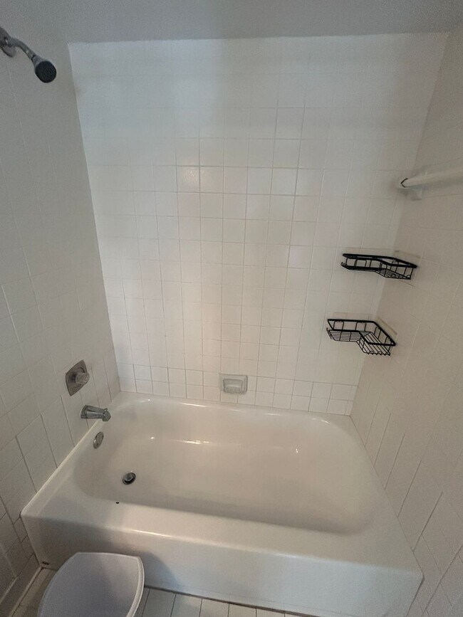 Building Photo - Now Leasing: 1-bedroom and 1.5 bath condo ...