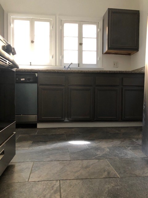 KITCHEN FLOOR AND CABINETS - 410 N Orange Grove Ave