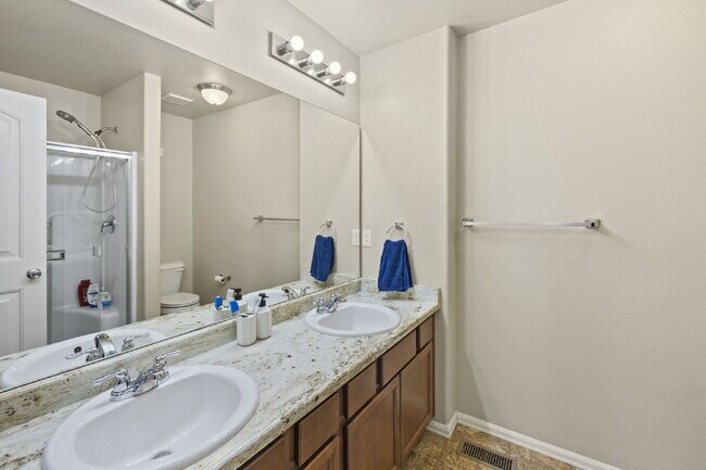 Building Photo - "Beautiful Townhome 3-Bedroom  2.5 Baths no carpet home, just 7 minutes from Fort Carson!"