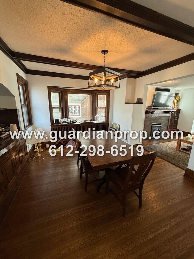 Building Photo - Merriam Park House Available May 1st, Updated Kitchen, Office, Fenced Yard, 2 Car Garage