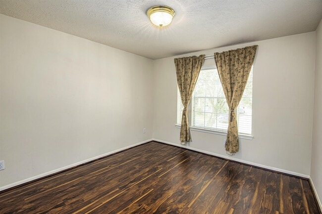 Building Photo - 6219 Surfside Ln