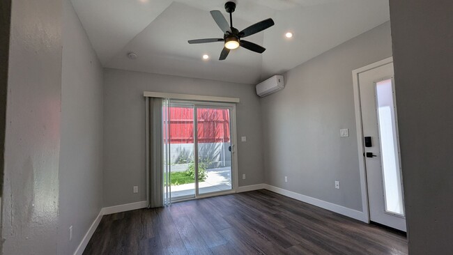 Building Photo - Fenced Private Yard in Newer Build Studio ...