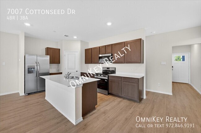 Building Photo - 7007 Cottonseed Dr