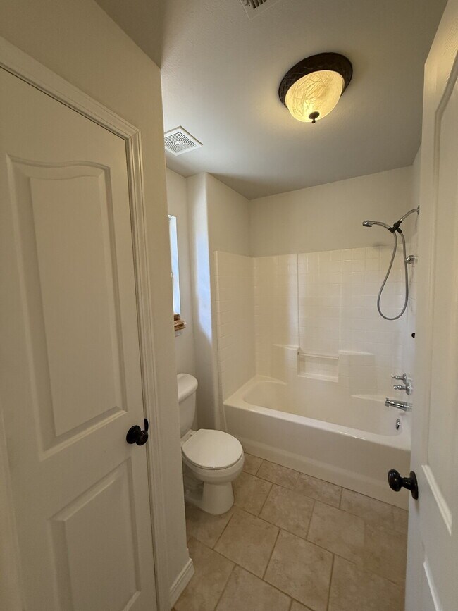 Building Photo - Spacious 3 BR with a fenced in backyard