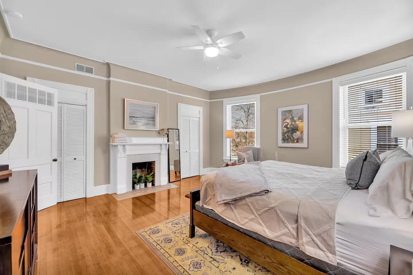 Primary BR with fireplace and double closets. - 1104 Cross Ln