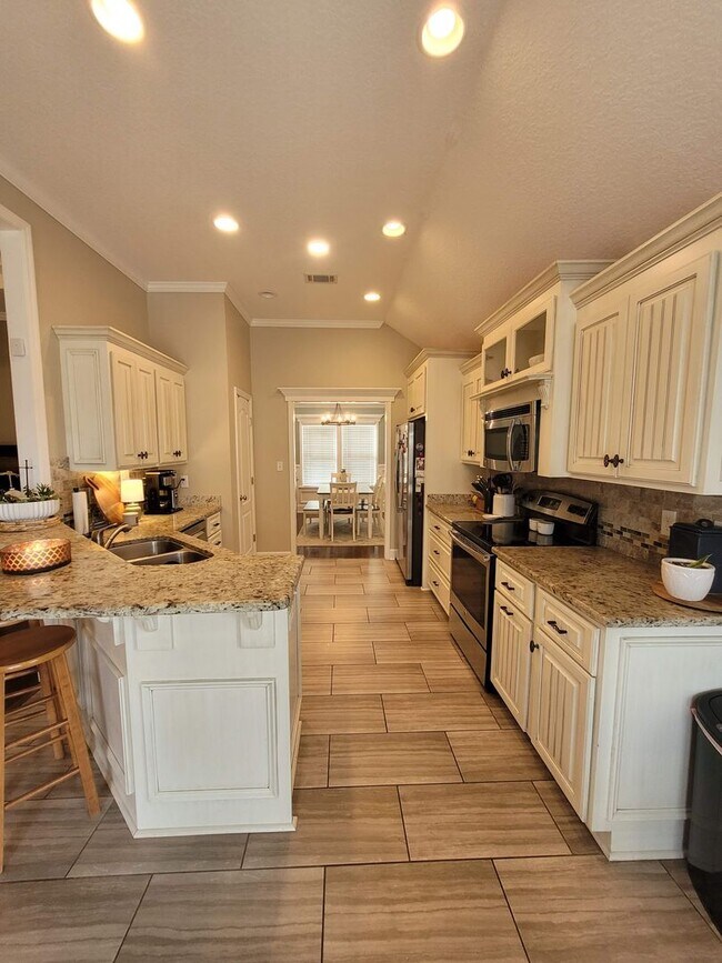 Building Photo - Exquisite Southern Living: 3BR/2BA Gem with Modern Touches, Fenced Yard, and Community Pool in Be...