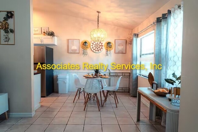 Building Photo - Beautifully furnished  2-Bedroom Duplex – ...