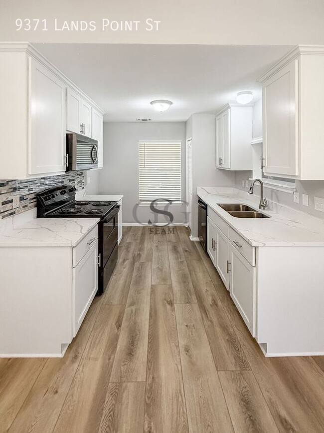 Building Photo - 9371 Lands Point St